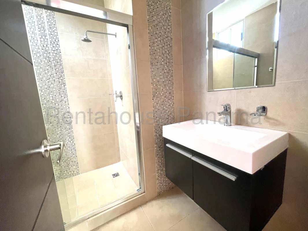 Modern bathroom with glass shower, mosaic tile accents and floating vanity in PH San Francisco Bay
