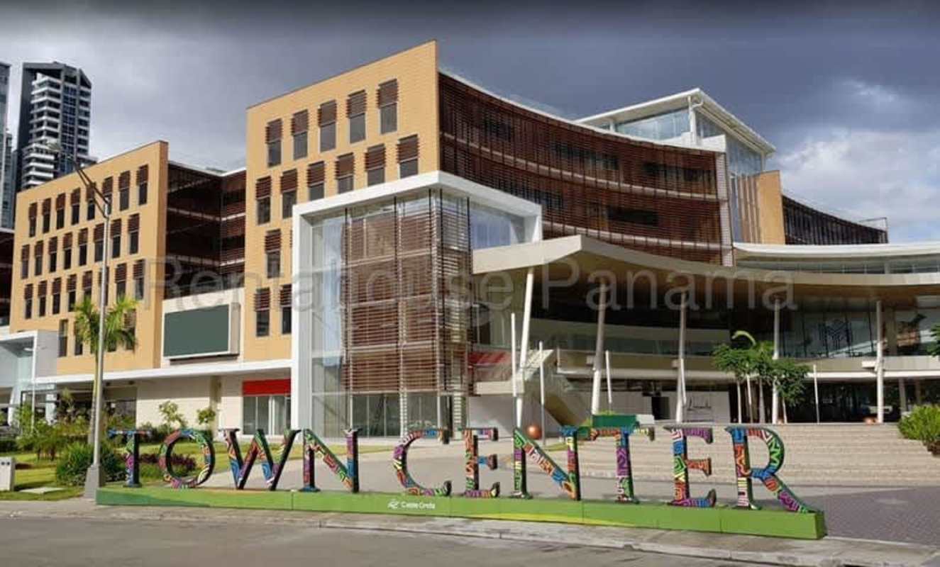 Exterior facade with Town Center colorful sign Panama City commercial building