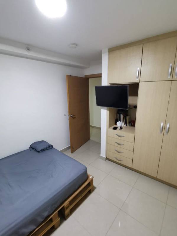 Contemporary bathroom with glass shower, toilet, vanity sink in PH Rokas Condado del Rey Panama