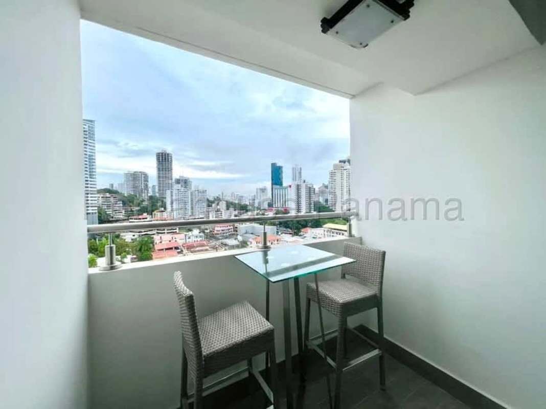 Balcony with glass railing city skyline view PH Bella Vista Tower Panama City