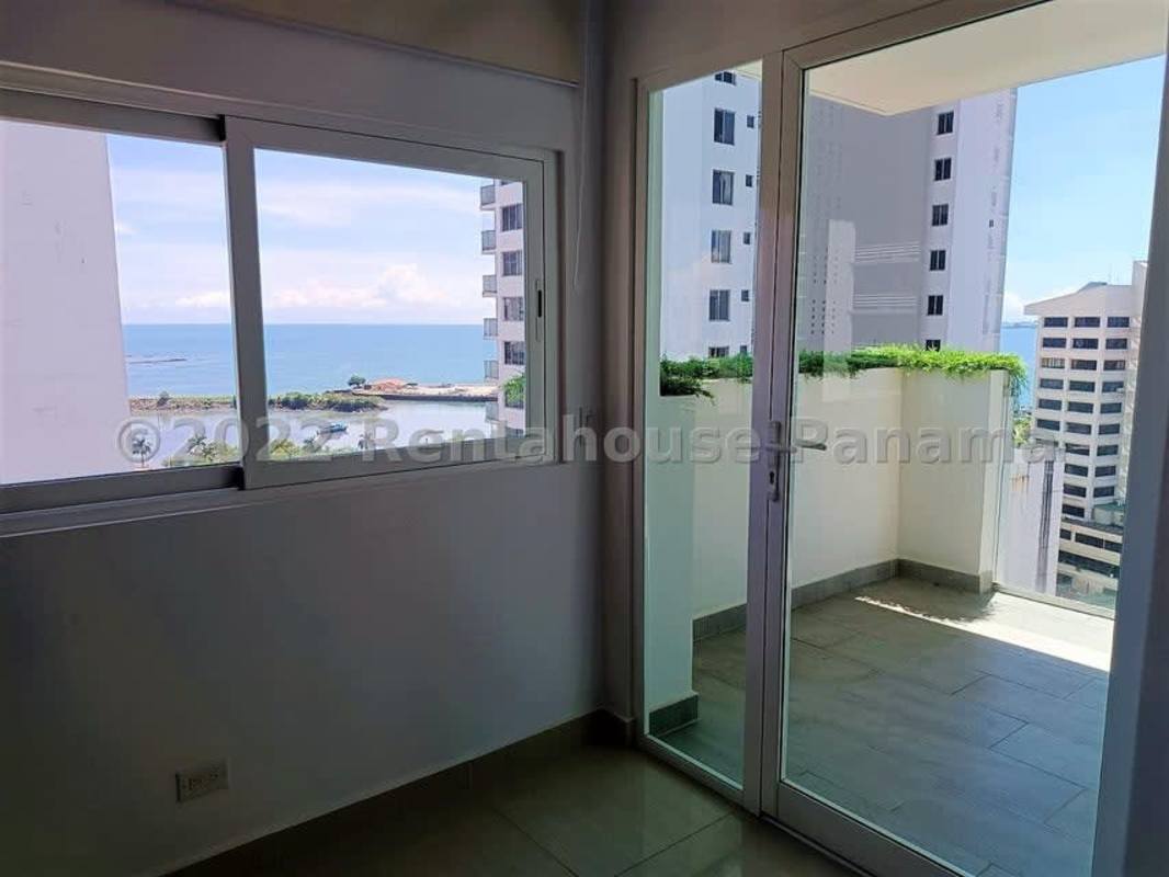 Open kitchen with granite countertops, stainless appliances in Bella Vista Park Panama apartment