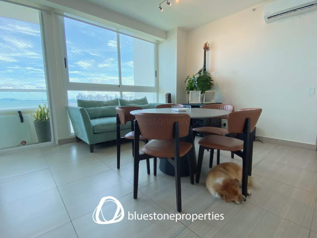 Bright bedroom with ocean view, large window, and minimalist design in PH Asia apartment Panama