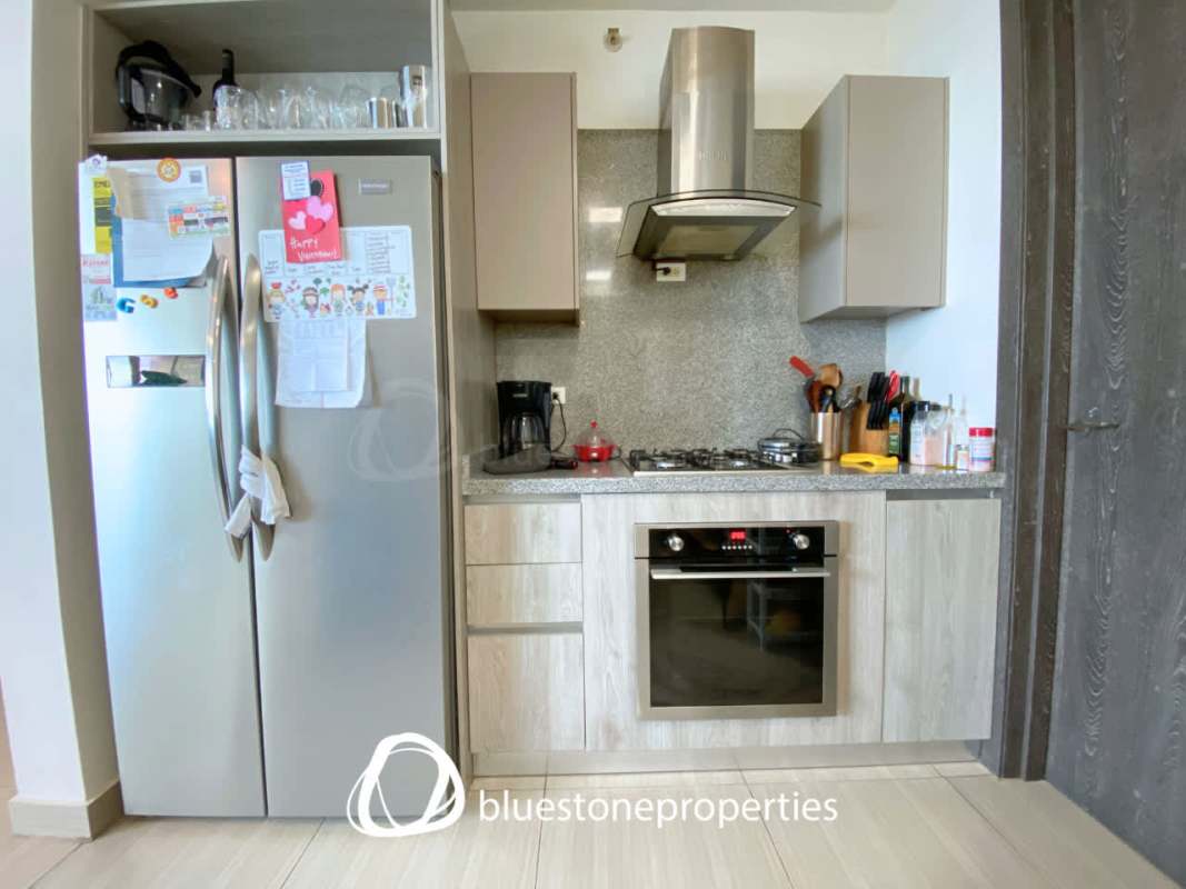 Luxurious master bedroom with walk-in closet and floor-to-ceiling windows oceanfront in PH Asia Panama