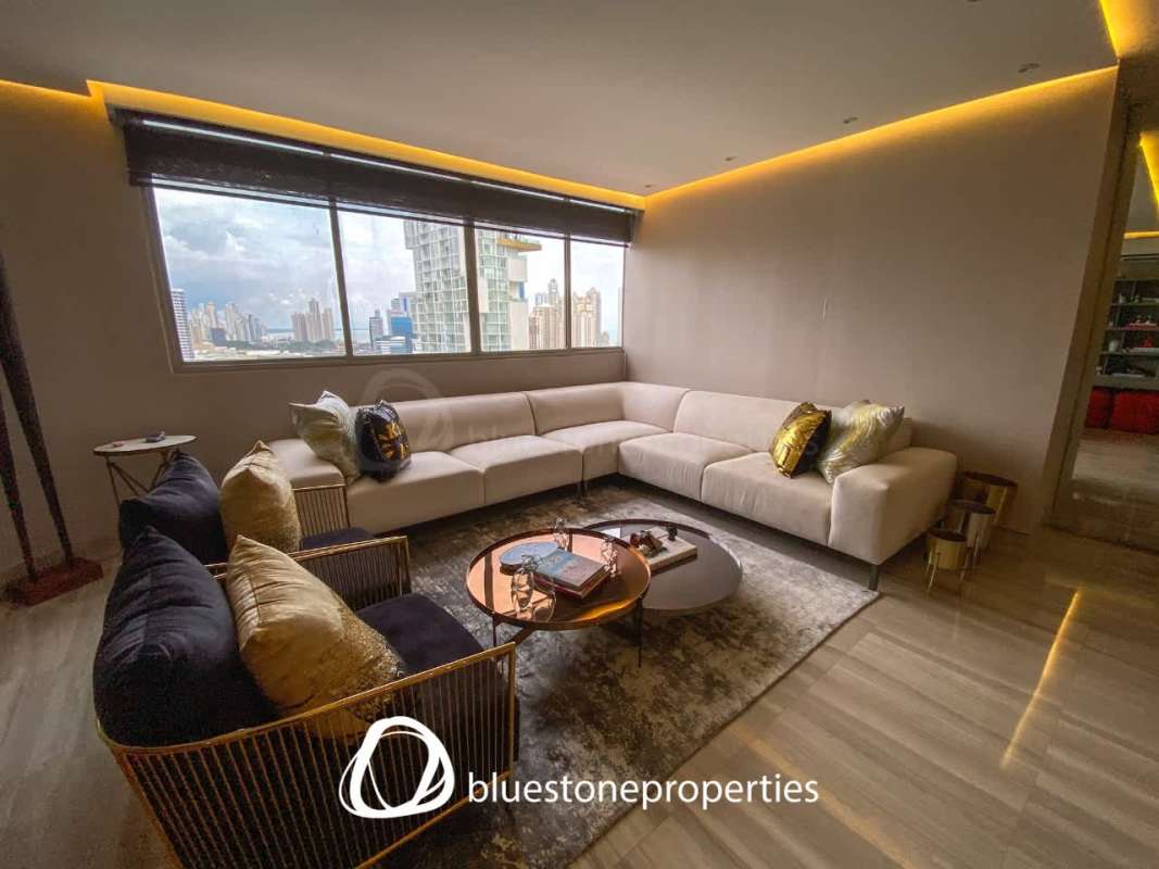 Modern bedroom with large windows city skyline view PH Marriott Residences Panama