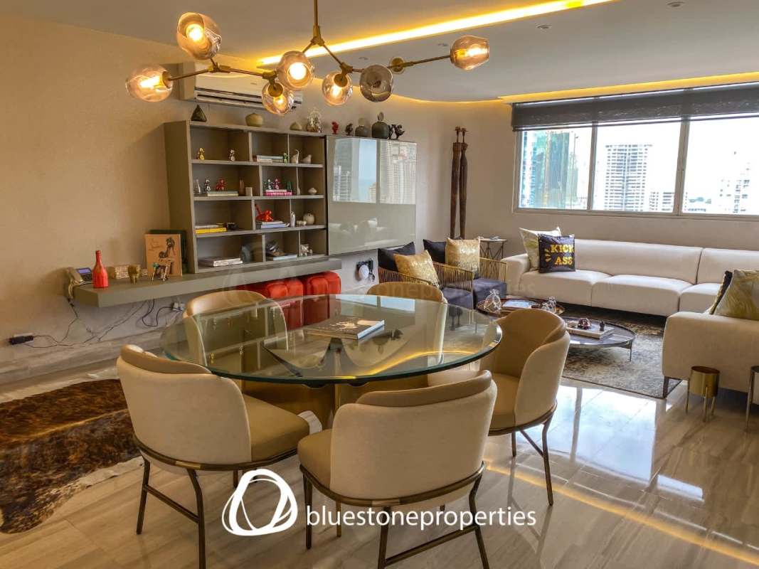 Elegant living dining area marble flooring panoramic views PH Marriott Panama