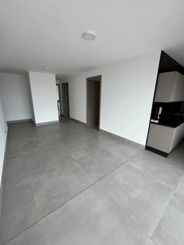 Bright living room with sea view balcony at Victory Wellness Coco del Mar Panama