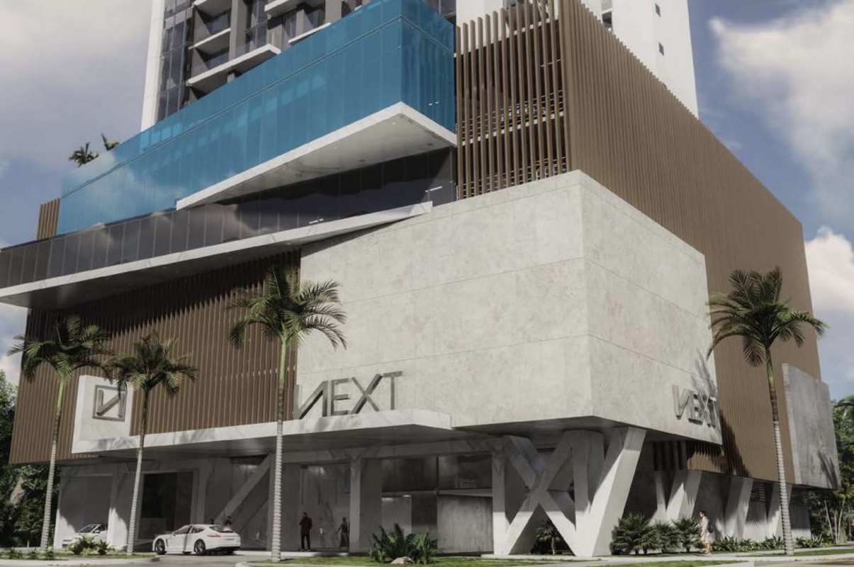NEXT Tower Coco del Mar modern architecture glass balconies palm trees entrance Panama