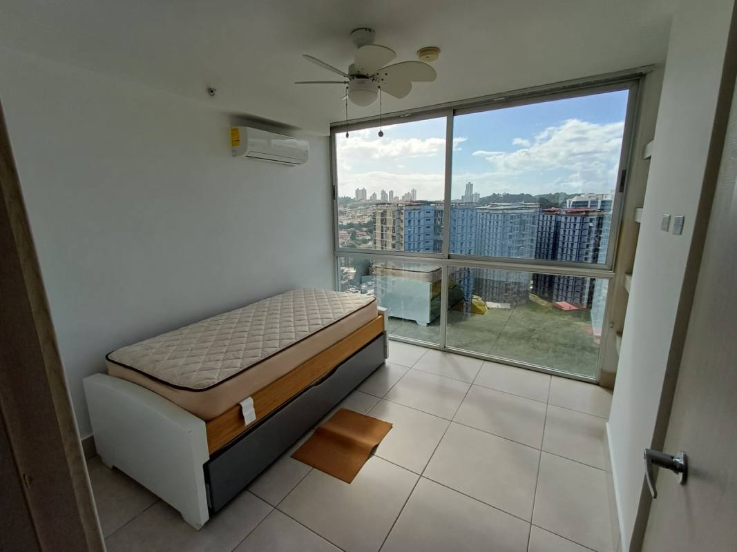 Minimalist bedroom with floor-to-ceiling window city view in PH Sky Point Panama furnished rental