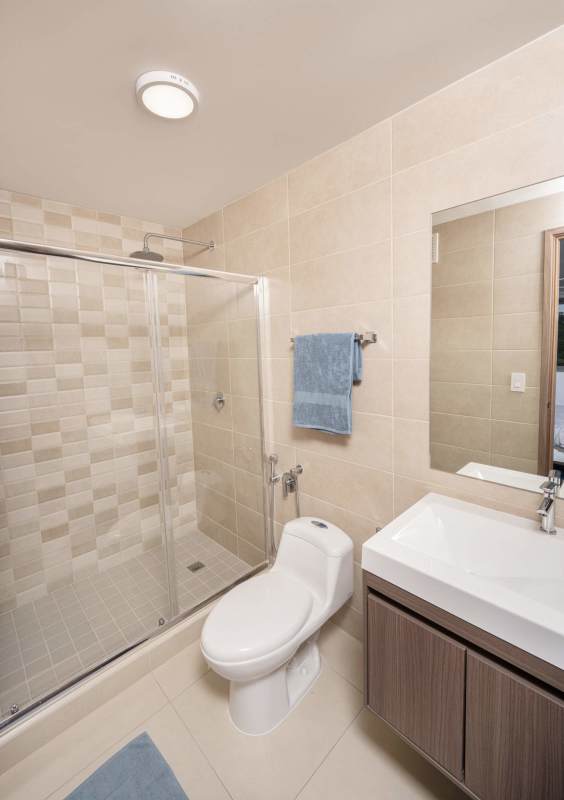 Bedroom with panoramic mountain view, modern design and tile floors at PH Spotlight Condado del Rey