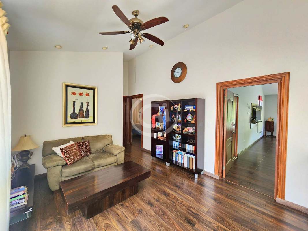 Remodeled kitchen with granite island, wood cabinetry, premium appliances Camino de Cruces