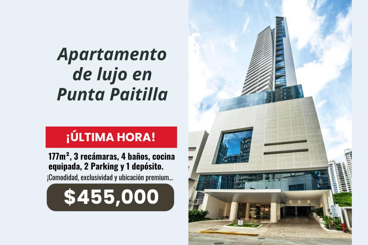 Tall white glass building PH Deluxe Residences in Punta Paitilla Panama City skyline