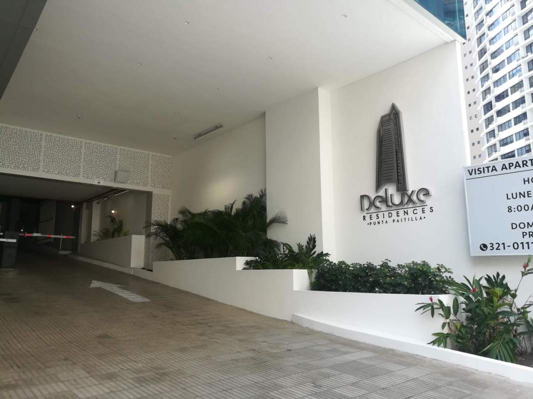 Secure driveway entry with barrier gate at PH Deluxe Residences Punta Paitilla Panama