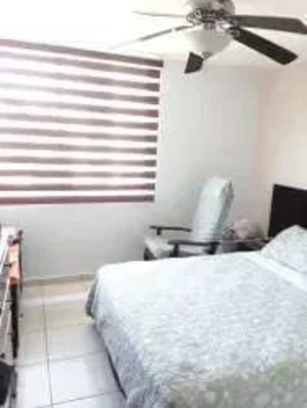 Compact kitchen with granite countertops and stainless refrigerator PH Sunset Place Panama