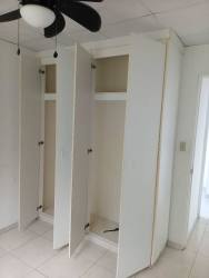 Empty bedroom with ceiling fan and barred window Quintas del Pacifico Panama