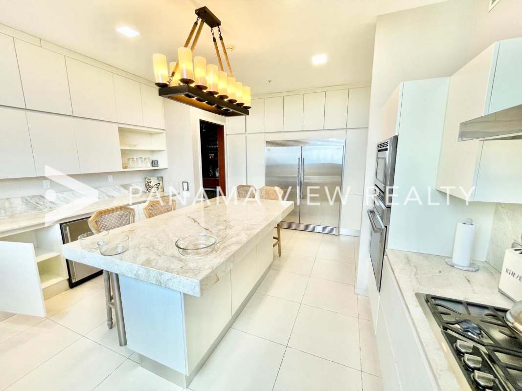 Spacious master bedroom with marble floors balcony panoramic views Santa Maria Golf Panama