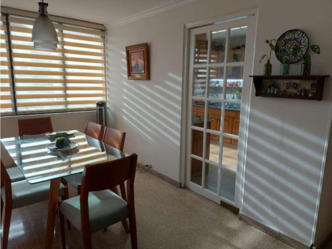 Covered balcony overlooking city skyline PH La Alameda Betania Panama apartment