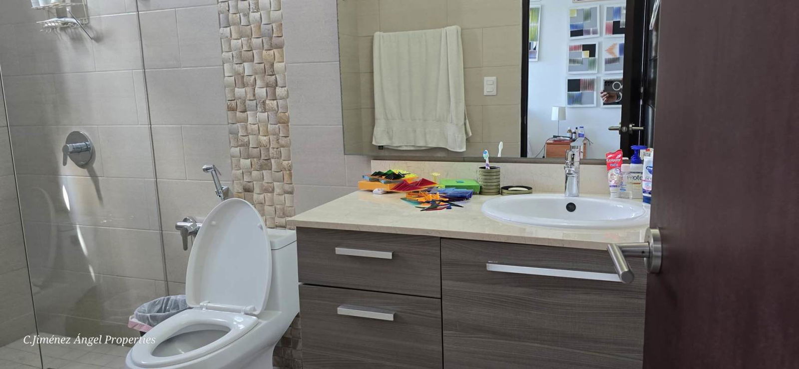 Luxurious master bedroom with large windows overlooking ocean at PH Dal Mare Coco del Mar Panama