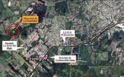 Satellite map showing the marked 4-hectare land parcel with nearby schools and streets in La Chorrera Panama