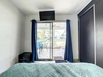 Equipped kitchen with granite counter, appliances, breakfast area PH Ibiza Beach San Carlos Panama