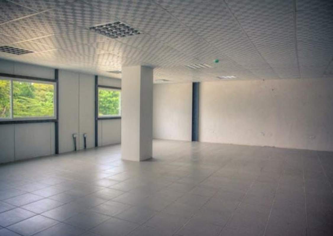 Mezzanine level with guardrail overlooking warehouse space in Las Mañanitas Panama