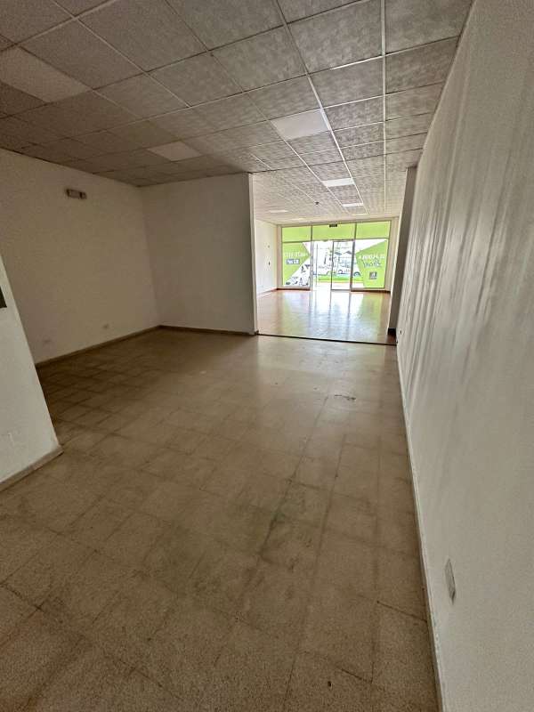 Empty commercial interior with tile floor and front window City Plaza Aeropuerto Don Bosco Panama