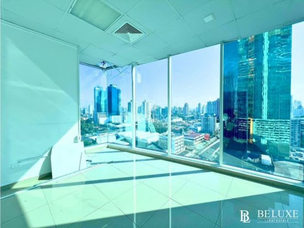 Corner empty office with floor-to-ceiling windows, tile floors at Torre Global Bank Calle 50