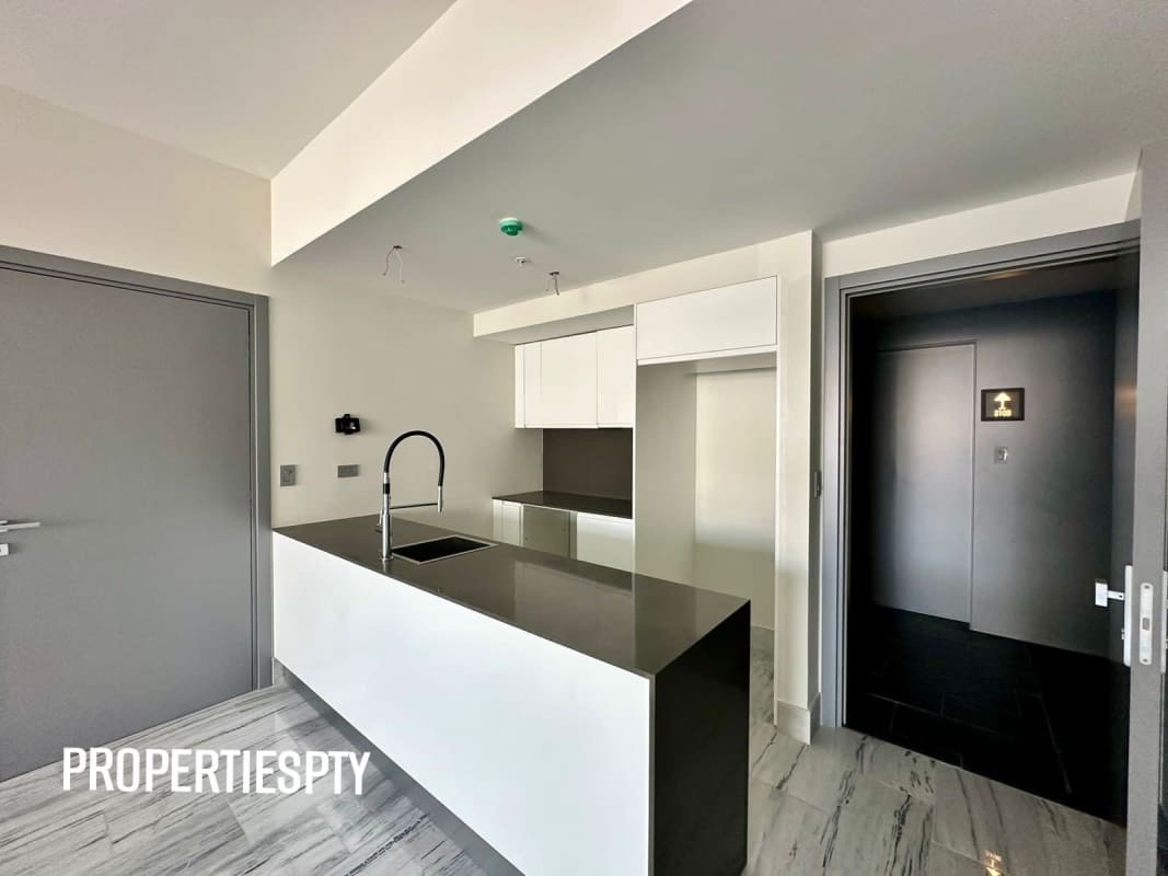 Aerial view of Panama City skyline waterfront high-rises and Cinta Costera park near Nuovo by Armani