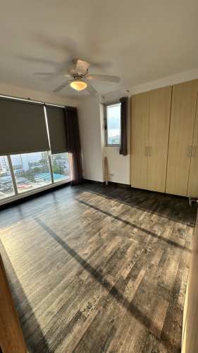 Bright living room with balcony, city skyline and ocean view PH Marina Plaza Coco del Mar