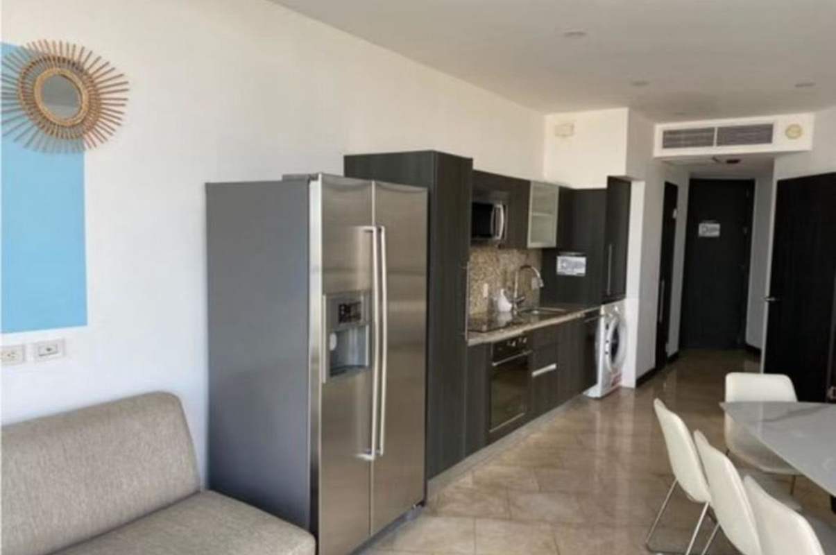 Fully equipped modern kitchen with stainless appliances in rented apartment JW Marriott Punta Pacifica