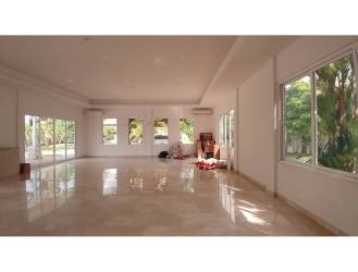 Spacious open concept living and dining area with large windows in Bosques del Pacífico Panama Pacifico house for rent
