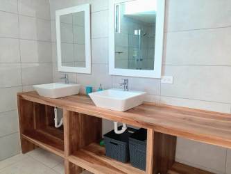 Balcony with views of saltwater lagoon pool and Pacific ocean Playa Blanca Panama