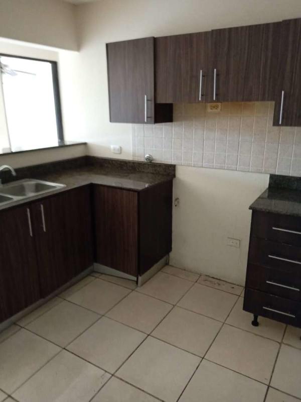 Kitchen with granite countertops, cabinets and window PH Beyona Park Parque Lefevre Panama City