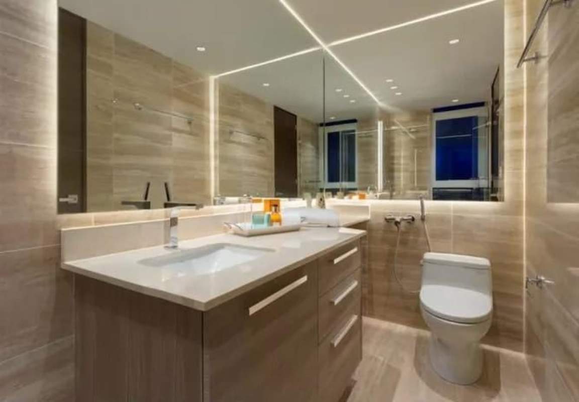 Contemporary bathroom with glass shower enclosure at PH The Regent Costa del Este