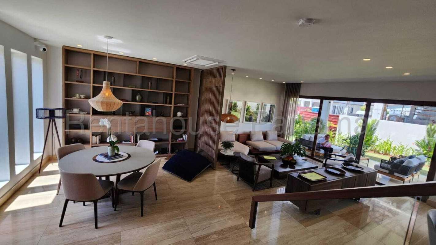 Spacious main bedroom with ensuite walk-in closet and golf view in luxury home The Woods Panama