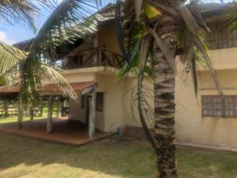 Exterior two-level tropical beach house with balcony Palenque Panama