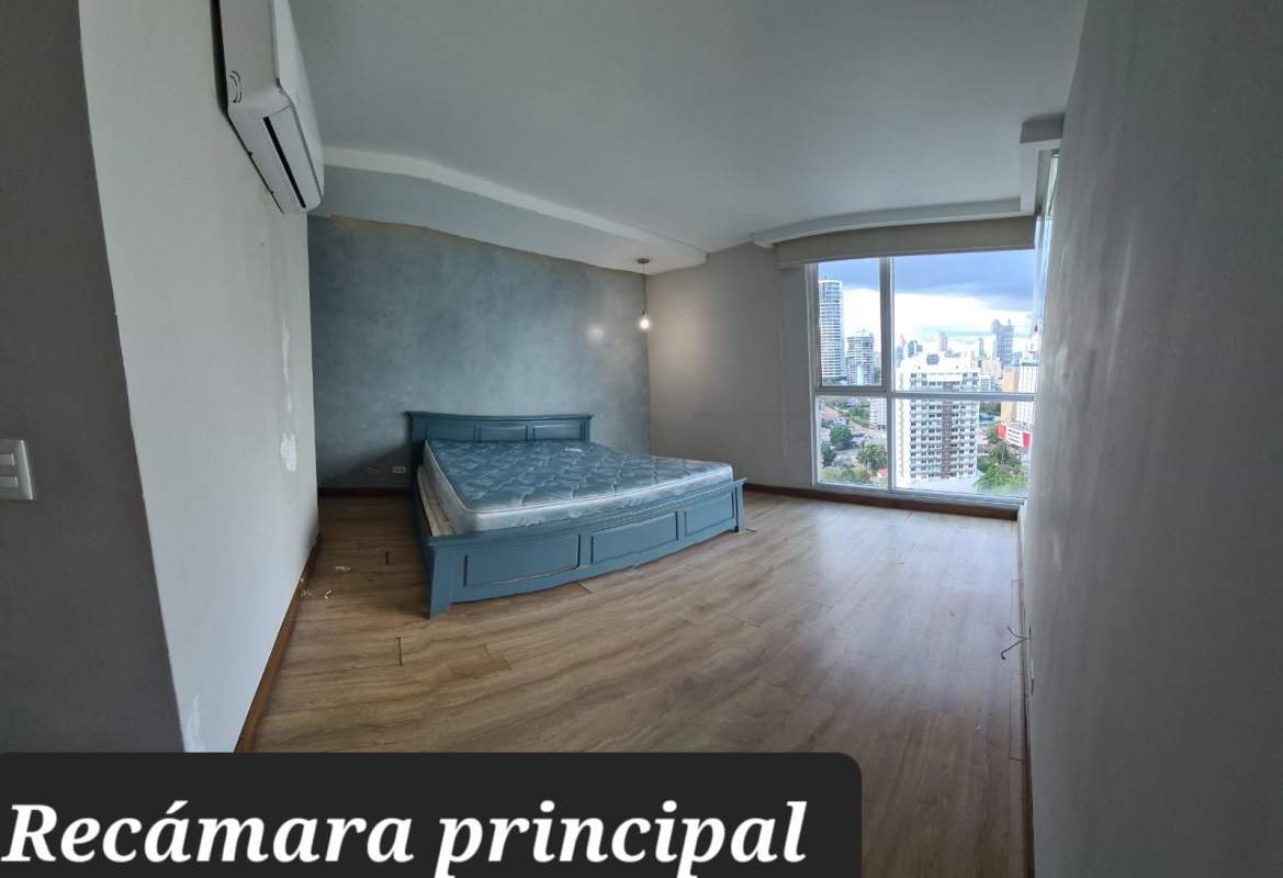 Dining area with large window and ocean city views PH Blue Park Panama