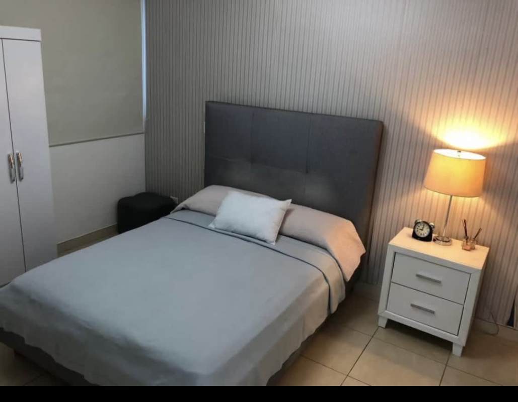 Modern bathroom with glass shower enclosure and vanity PH Oasis Panama City