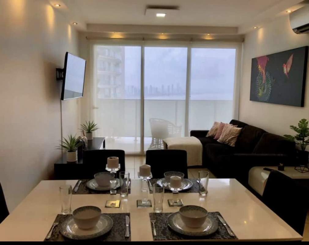 Contemporary kitchen with granite counters, wood cabinets and appliances PH Oasis Panama City