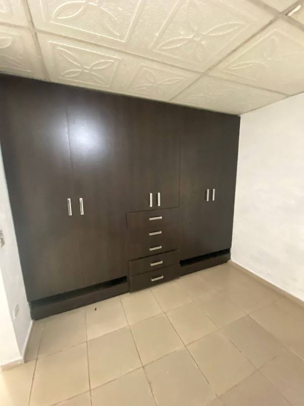 Spacious bedroom with large wardrobe in Praderas de San Lorenzo Panama home