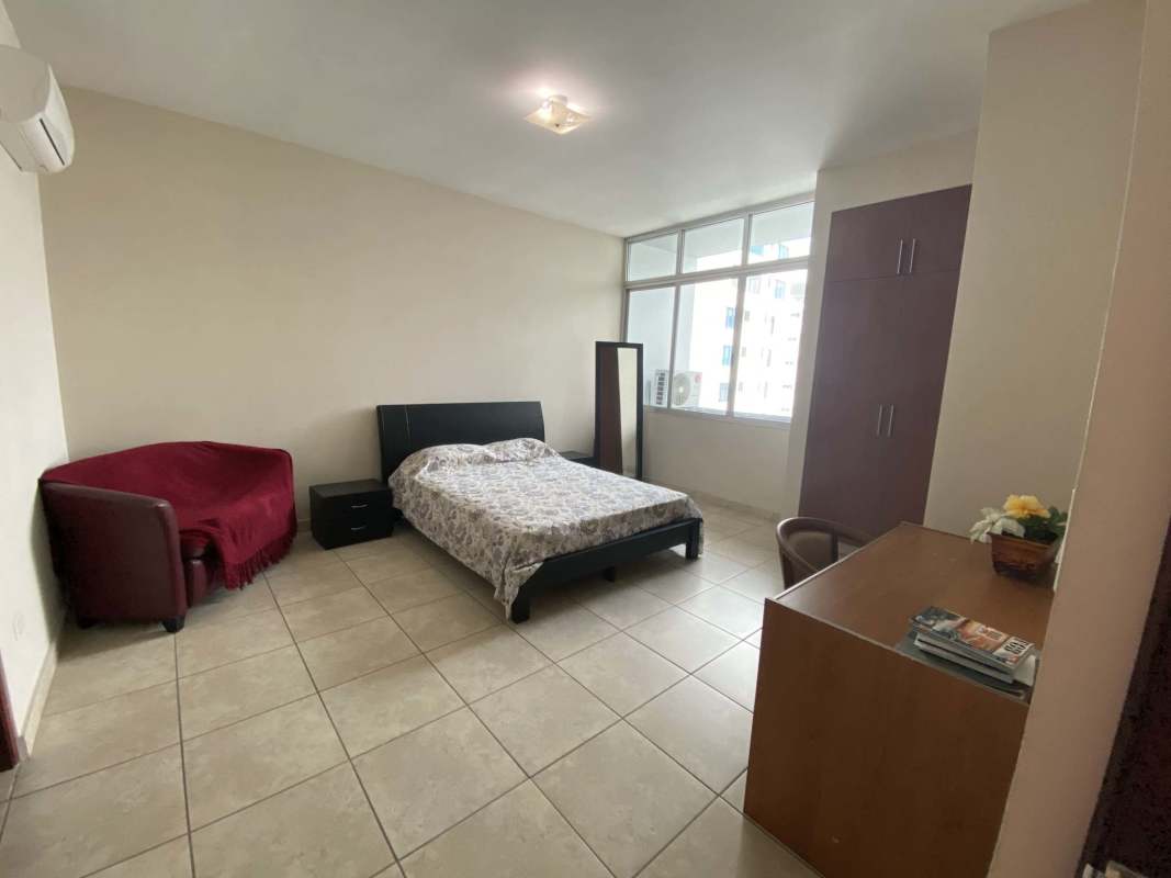 Luxury bathroom with marble counters and glass shower at PH Paramount, San Francisco Panama