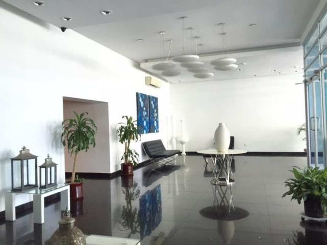 Modern living room with large windows and ocean views in PH Seascape Costa del Este Panama