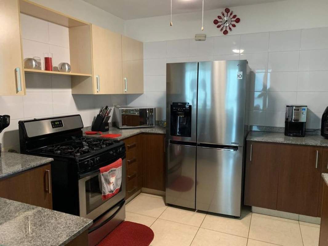 Kitchen equipped with appliances and granite countertops in PH Seascape