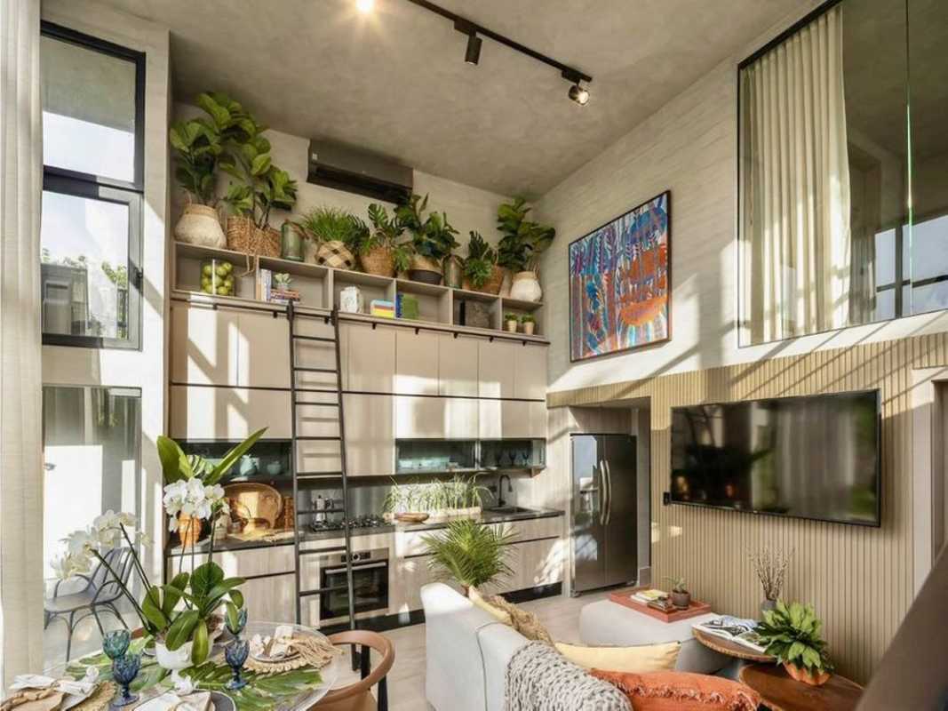 Skyline view with infinity rooftop pool and social area at PH The Garden Condo