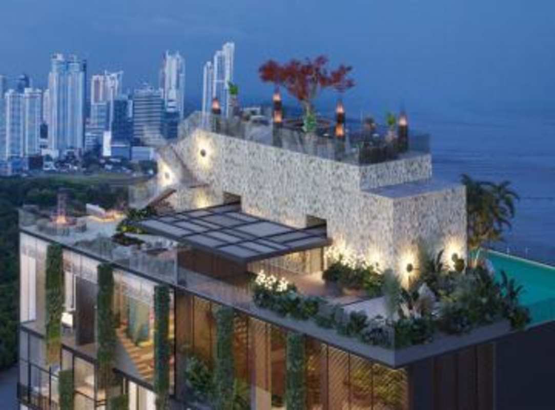 Open plan living-dining room with large windows at PH The Garden Coco del Mar