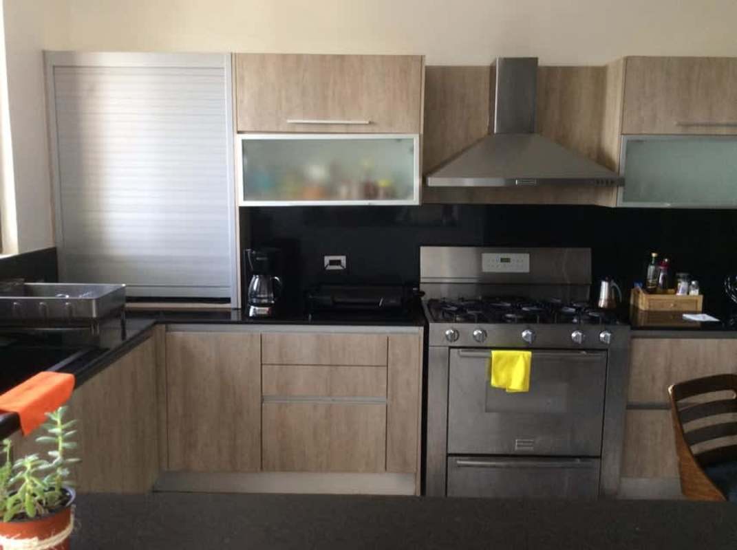 Spacious granite countertop kitchen with appliances in PH Clayton Forest Reserve Clayton Panama