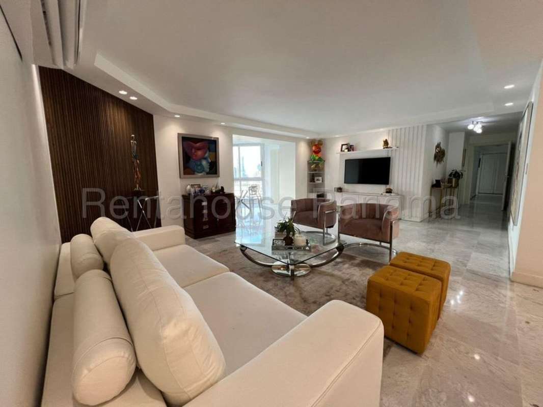 Stylish kitchen with premium marble finishes and built-in seating in luxury apartment Punta Paitilla Panama