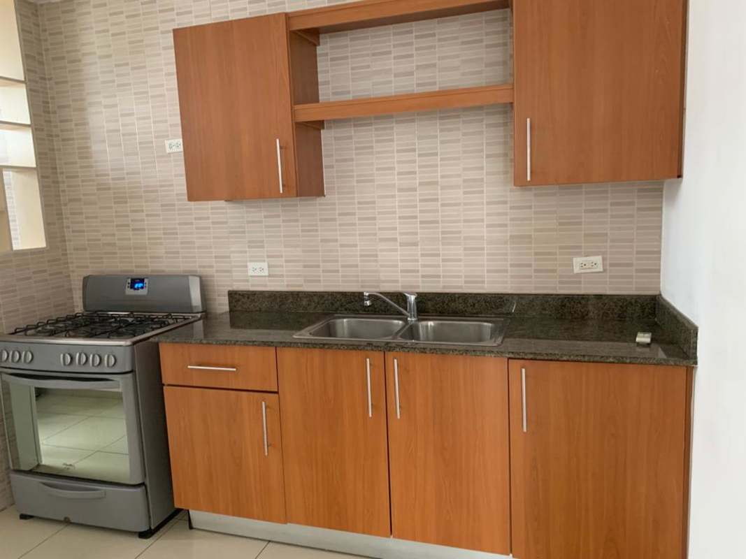 Modern bathroom with glass shower enclosure and pedestal sink PH San Francisco Bay Panama