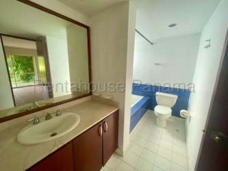 Bedroom with large window and tile floor in Royal Decameron villa Coclé Panama