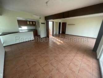 Living room in villa with large windows and terrace access inside Royal Decameron Panama