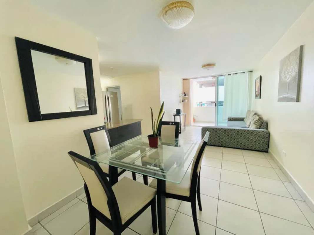 Large condominium outdoor swimming pool and deck with lounge area in Condado del Rey Panama City